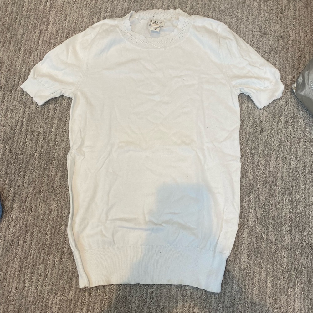 White jcrew short sleeve shirt with ruffled like flower neck and arm ends